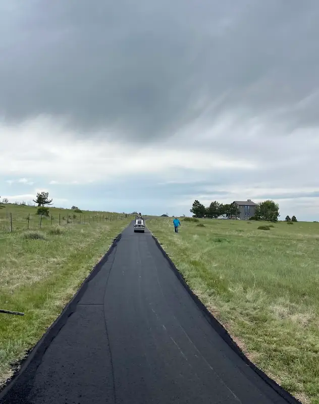 Long asphalt driveway in Elizabeth being installed